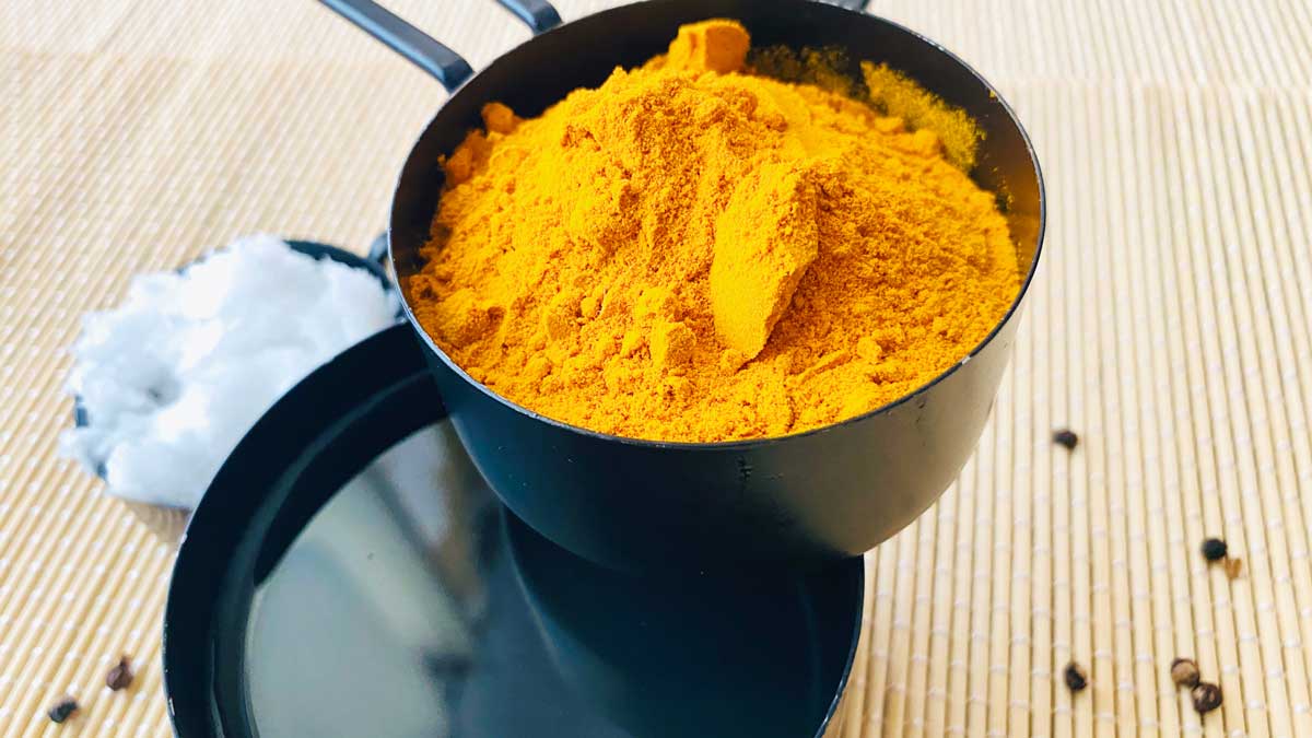 The four ingredients to make the golden paste for pets and humans with turmeric, organic coconut oil, water and black pepper